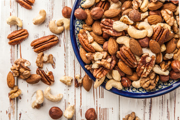 Mix of different nuts closeup photo