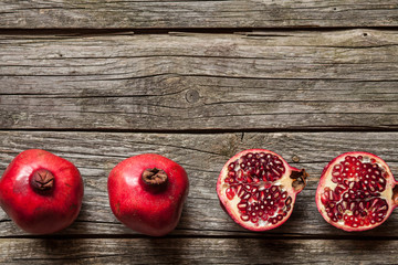 Pomegranates on wooden table