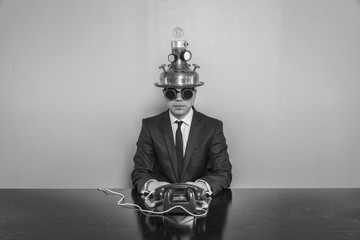 Vintage businessman sitting at office desk