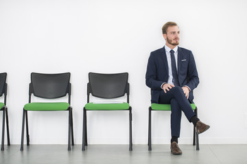 Stressed business people waiting for job interview