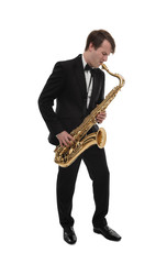 Naklejka premium Saxophonist in a tuxedo plays music on sax.