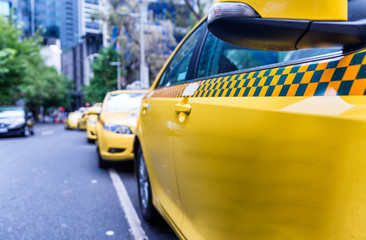 Fototapeta na wymiar Parked taxi in Melbourne street, Australia