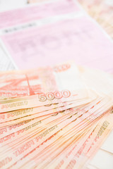 Fototapeta premium Russian money five thousand roubles with payment receipts
