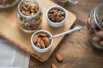 Assorted nuts: walnuts, almonds, hazelnuts and honey