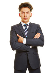 Geschäftsmann mit verschränkten Armen