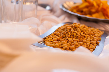 buffet restaurant, snack, salted nuts in a dish, salty snacks, restaurant, delicacies, snack to beer