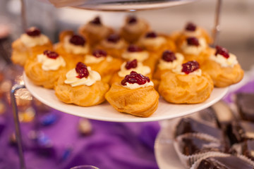 fourchette, custard cakes, Sweet holiday buffet with cupcakes and other desserts, cathering in the restaurant, chocolate cakes