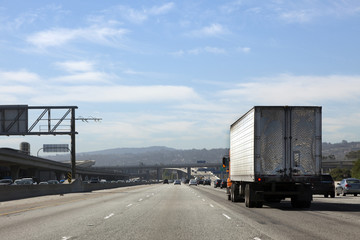 Rear View of Semi Truck on Highway