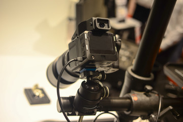 Professional digital camera shooting object in studio