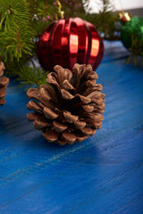 Christmas tree and decorations on wooden background