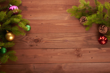 Fototapeta na wymiar Christmas tree and decorations on wooden background