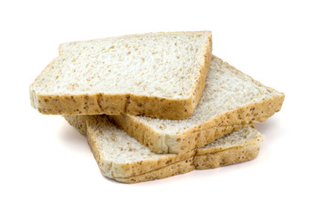 sliced whole wheat bread on white background.