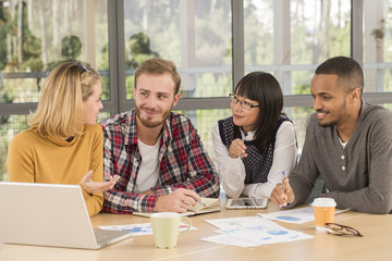 Young business people working at office on new project