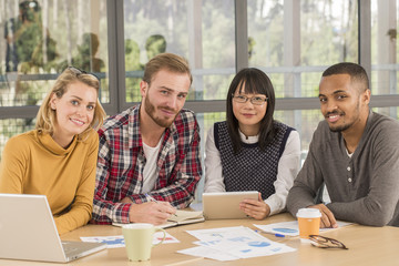 Young business people working at office on new project
