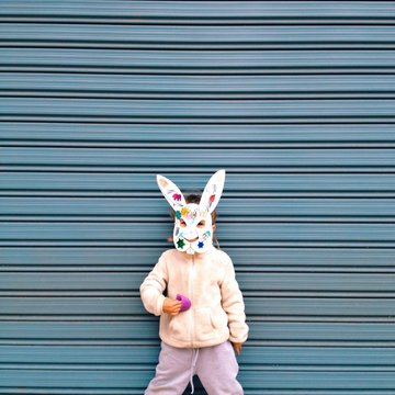 Girl wearing a bunny rabbit  mask