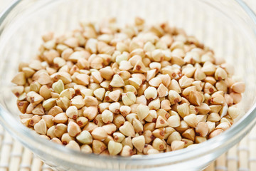 Buckwheat in glass bowl close up