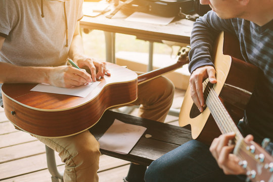 Learning to play the guitar. Music education and extra-curricular lessons.