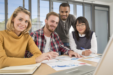 Young business people working at office on new project