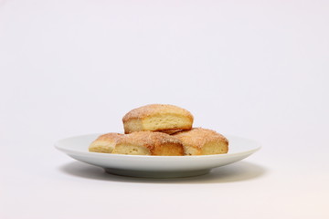 cookies sprinkled with sugar on white background