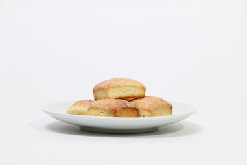 cookies sprinkled with sugar on white background