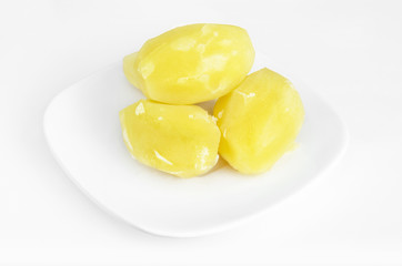 Boiled potatoes on a white background