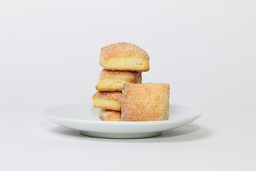 cookies sprinkled with sugar on white background