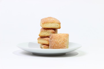 Fototapeta na wymiar cookies sprinkled with sugar on white background
