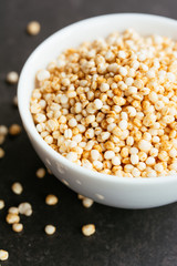 Puffed quinoa in small bowl