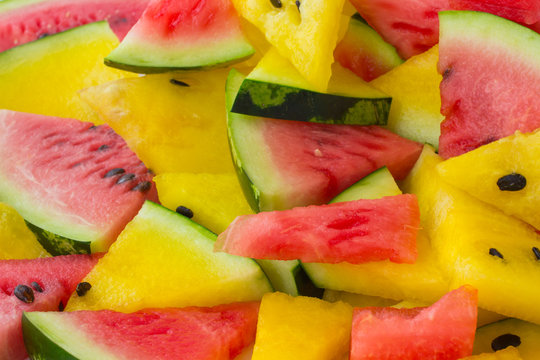 Slices of red and yellow watermelon