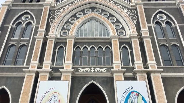 Tilt up on Roman Catholic Diocese, Thailand.