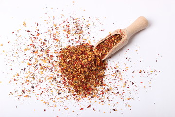 scattered seasoning on a white background