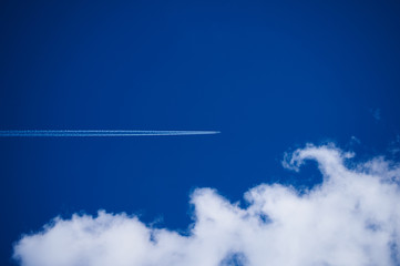 Airplane on tribal sky