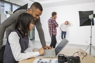 fashion photographer working in studio