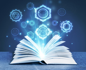 book with magic symbols