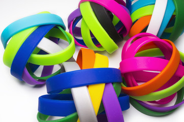 Rubber bracelets. Silicone fashion round social bracelet wear. white background
Rainbow Colors,  Elastic  Bands. Colorful  wristbands.
