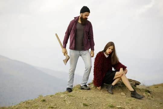 Man and girl on mountain