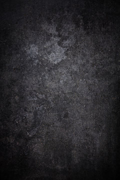 Textured black grunge background © enjoynz