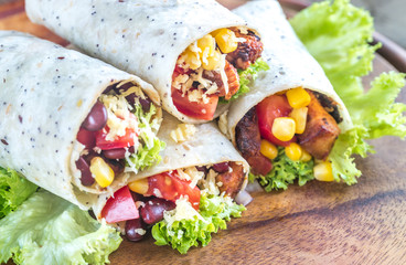 Four chicken burritos