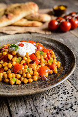 Traditional Indian Channa Masala – spicy chick peas with tomato, pepper and curry