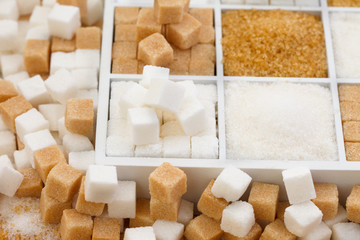 Various types of sugar, brown sugar and white 