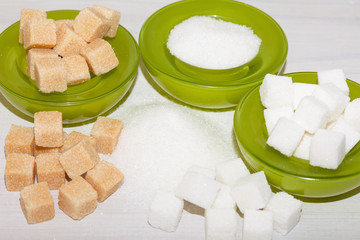 Various kinds of sugar in green bowls