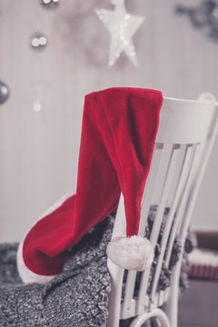 Christmas santa hat on a chair