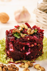 Fototapeta premium Beetroot salad with natural yogurt, garlic and walnut.