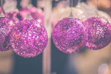 Close-up of pink Christmas bauble decorations