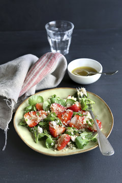 Quinoa salad with strawberry,goat cheese and watercress