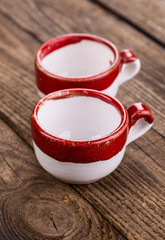 Black coffee, still life with cup and coffee beans.