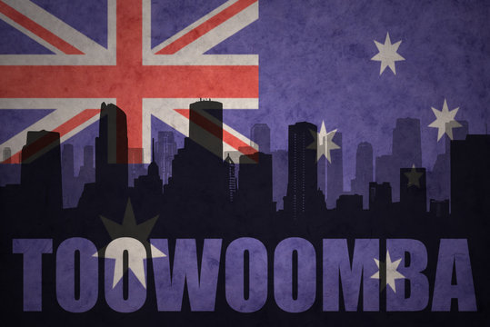 abstract silhouette of the city with text Toowoomba at the vintage australian flag