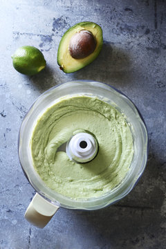 Avocado lime dressing in a food processor.Top view
