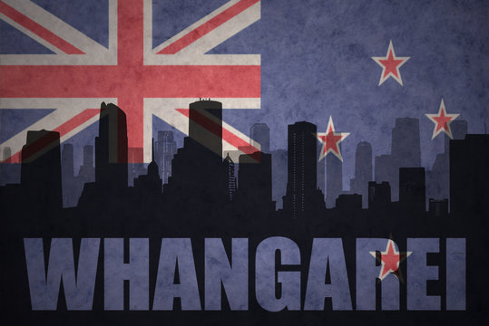 abstract silhouette of the city with text Whangarei at the vintage new zealand flag