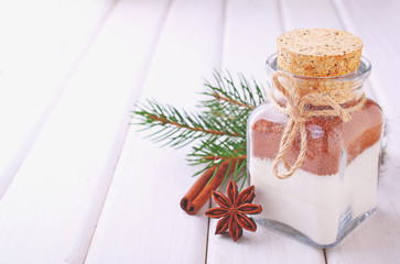 Christmas gift dry mix in a jar for cake on a white background